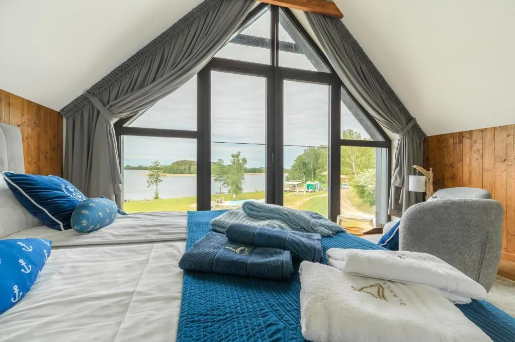 "Wioska Wakacyjna Glamila" Mazury, nad jeziorem, podgrzewany basen, Glamping i domki rodzinne